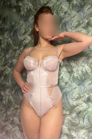 Redhead escort for outings around the city in Barcelona, pink lingerie, Sabrina.